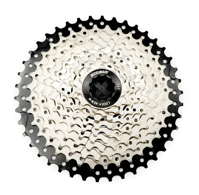 Hvordan forbedrer balancedesignet af kassettens tandhjul med bevægelsens glathed?